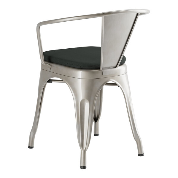 A Lancaster Table & Seating metal restaurant chair with black fabric cushion.