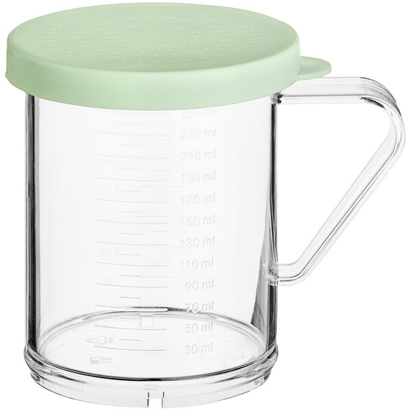 A clear polycarbonate shaker with a green lid.