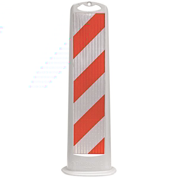 A white vertical parking lot sign with orange and white stripes.