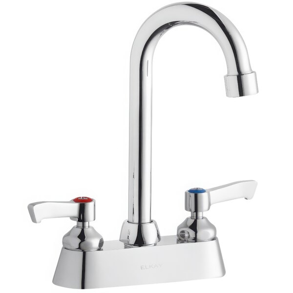 A silver Zurn deck-mount faucet with 4" gooseneck swing spout and 2" red lever handles.