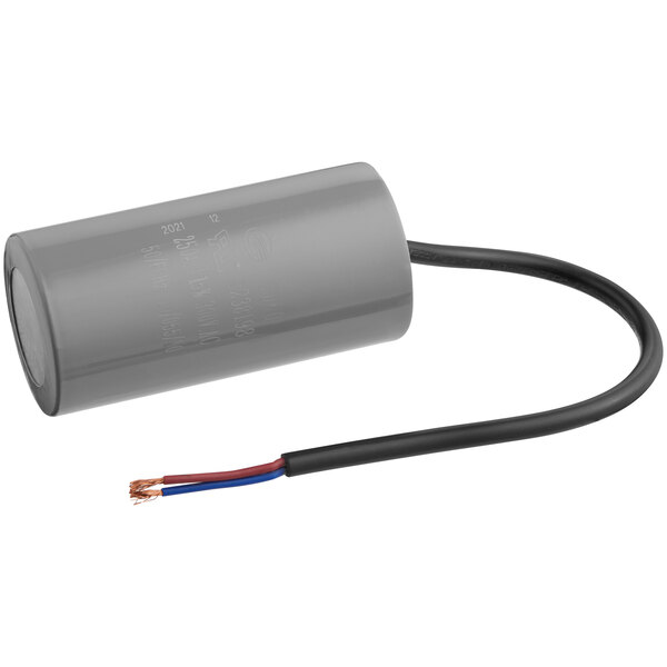 A close-up of a gray cylindrical capacitor with wires.