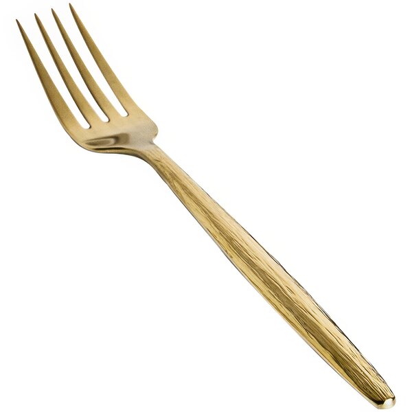 A close-up of a Front of the House Owen stainless steel dinner fork with a matte brass finish.