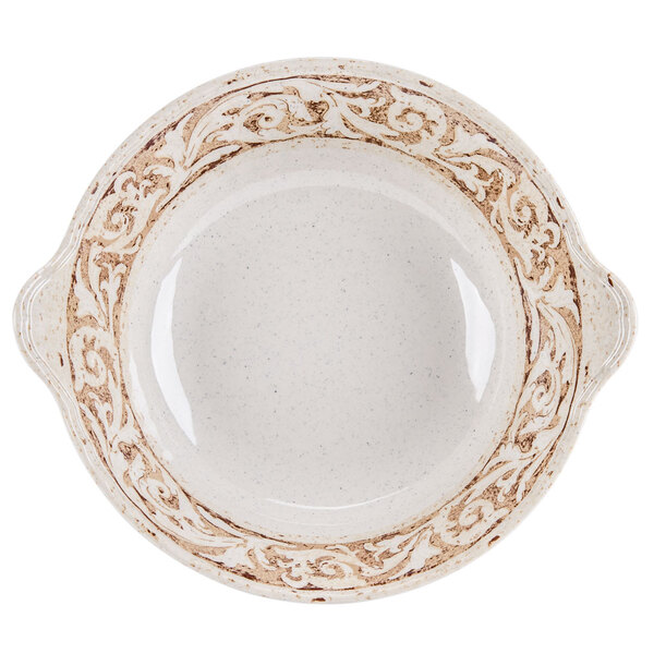 A white melamine bowl with a decorative design on it.