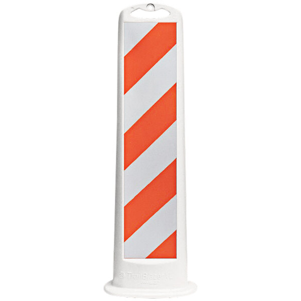 A white vertical sign with orange and white striped sheeting on the bottom and white engineer grade sheeting on the top.