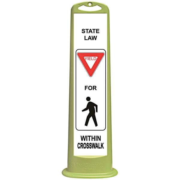 A green Cortina parking lot sign with white text and a red triangle that reads "State Law Yield For Pedestrian Crossing"