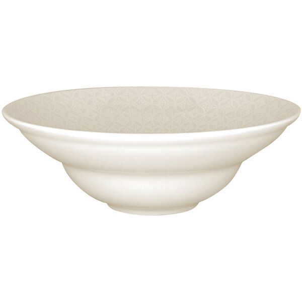 An ivory RAK Porcelain extra deep plate with an embossed lace pattern.