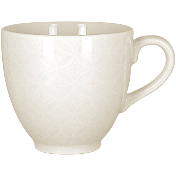 A RAK Porcelain ivory porcelain cup with an embossed pattern and a handle.