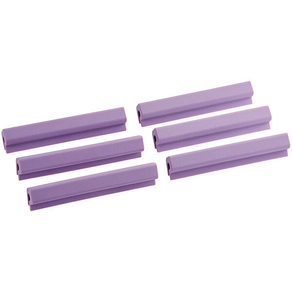 A group of four purple plastic Baker's Mark clips.
