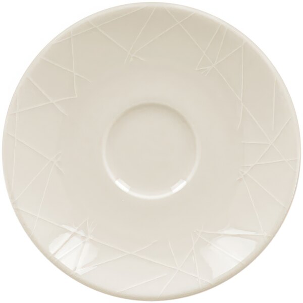 A white RAK Porcelain saucer with a crackled pattern.