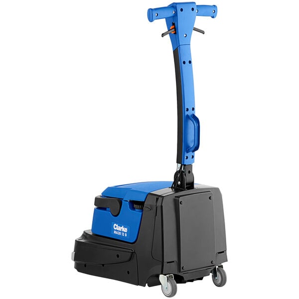 A blue and black Clarke MA30 walk behind floor scrubber with wheels.