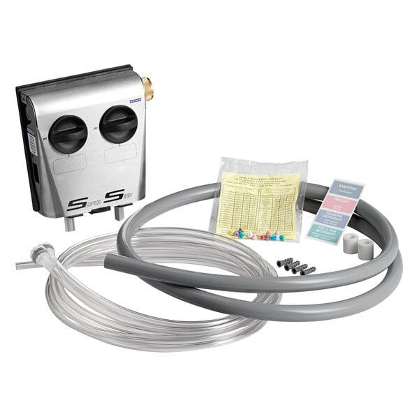 A Dema SuperSink 2 sink dispenser with air gap connected to a hose.