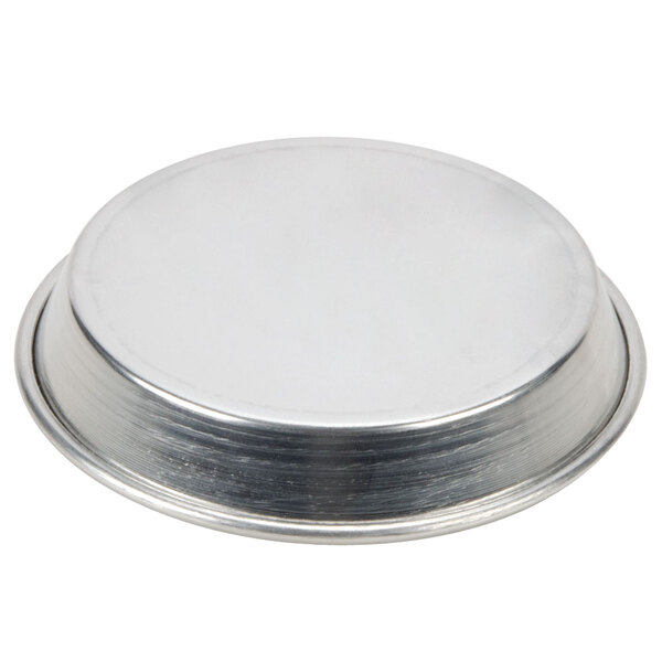 An American Metalcraft tin-plated steel deep dish pizza pan with a circular rim.