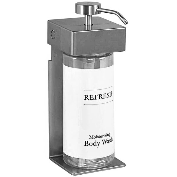 A white Dispenser Amenities wall-mounted shower dispenser with oval bottles.