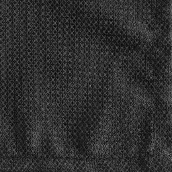 A close-up of a black Birdseye cloth napkin.
