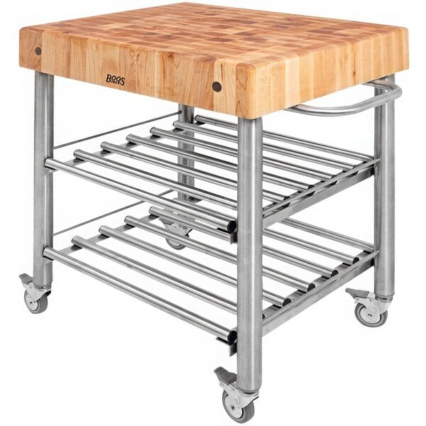 A John Boos & Co. maple wood kitchen cart with metal undershelves and towel bar.