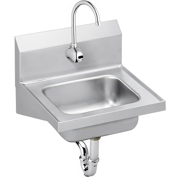 A stainless steel Zurn Elkay wall mounted hand sink with a hands-free faucet.
