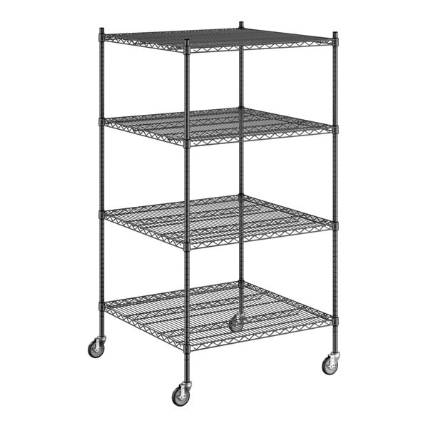 A Regency black wire shelving unit with wheels and four shelves.