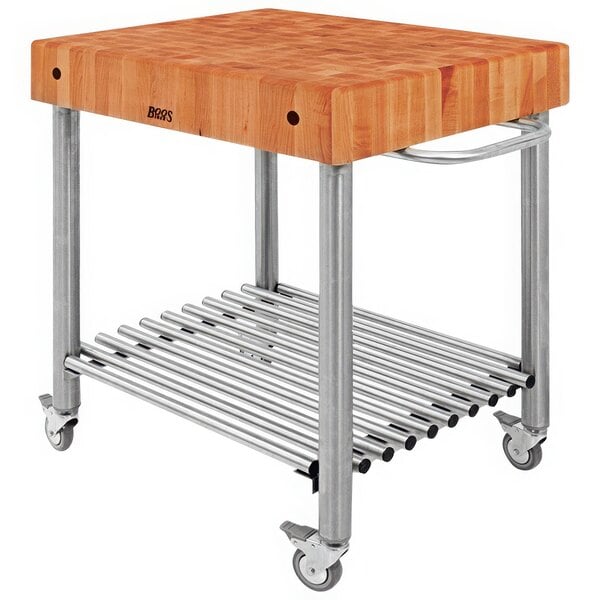 A John Boos cherry wood kitchen cart with a wooden cutting board on a metal frame.