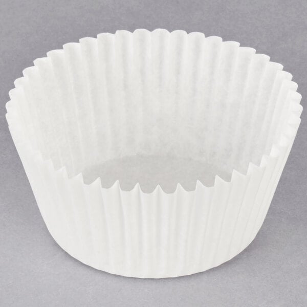 A white Hoffmaster fluted baking cup.