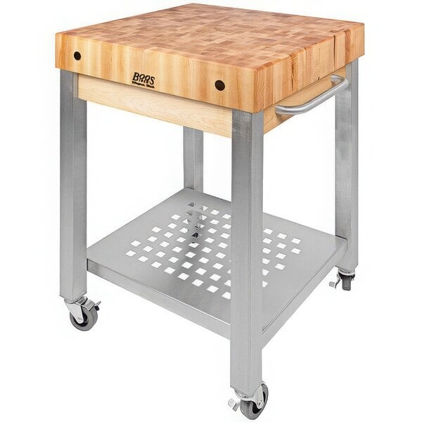 A John Boos wooden cutting board on a metal cart.