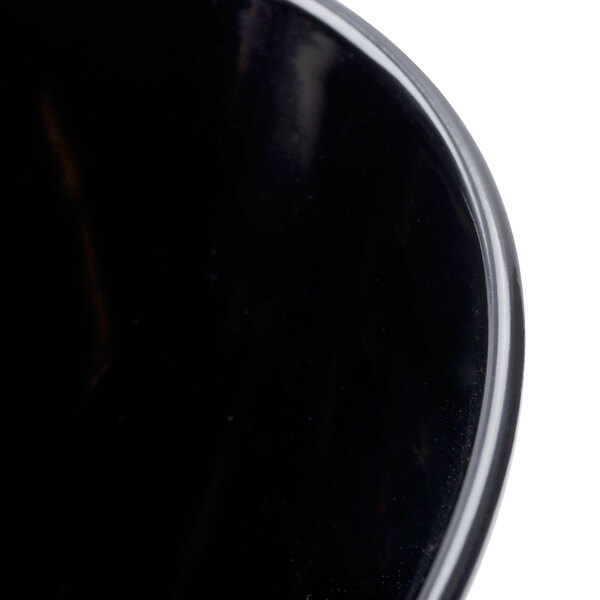 A close-up of a black GET Elegance melamine bowl.