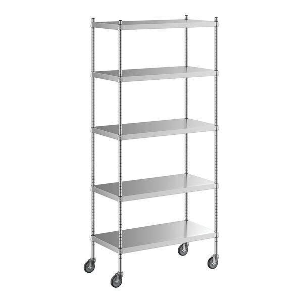 A Regency stainless steel mobile shelving unit with wheels.