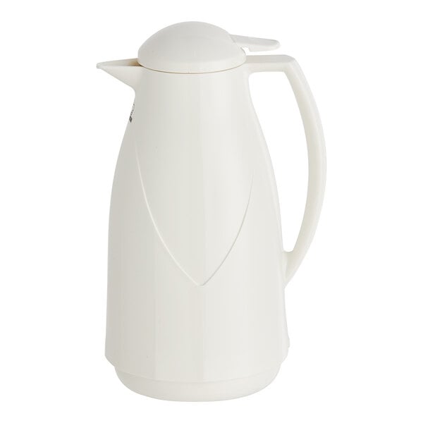A white Zojirushi glass-lined carafe with a handle and lid.