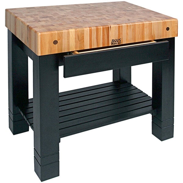 A John Boos black maple wood work table with undershelf and drawer.