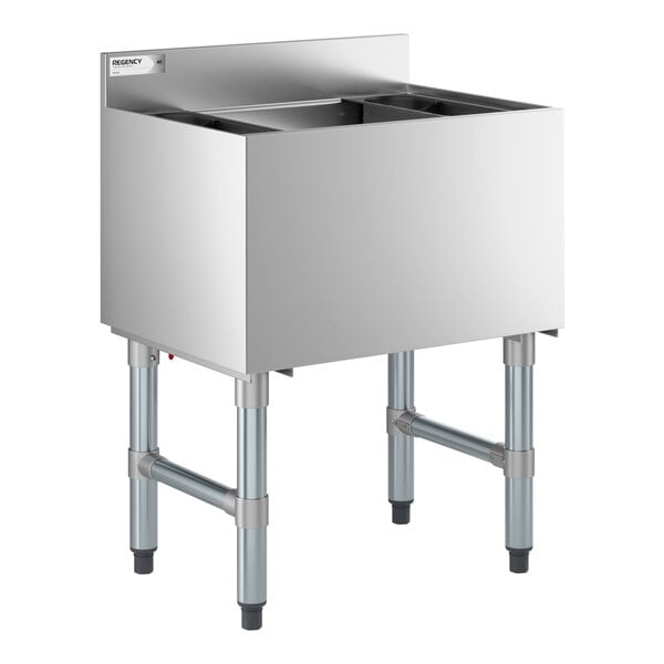 An underbar ice bin with a cold plate and bottle holders, made of stainless steel.