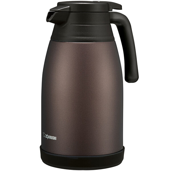 A brown and black Zojirushi stainless steel vacuum carafe with a screw off lid and black handle.