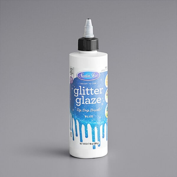 A container of Satin Ice Blue Vanilla Glitter Glaze with a white bottle and black cap.