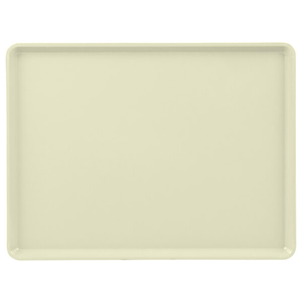 A beige rectangular tray with a white border.