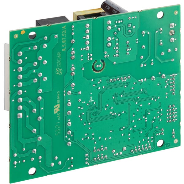 A green MainStreet Equipment relay control board with two small holes.