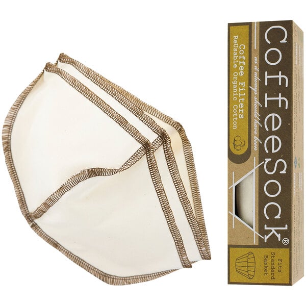 A white CoffeeSock basket style coffee filter with brown stitching next to a brown and white box.