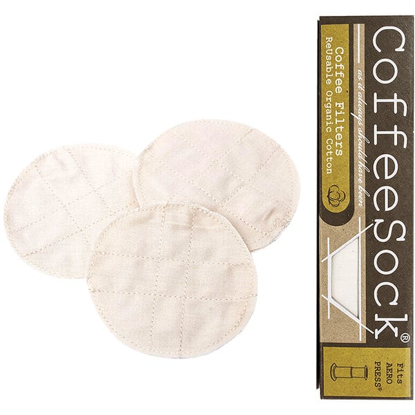 A group of CoffeeSock reusable coffee filter pads next to a box.