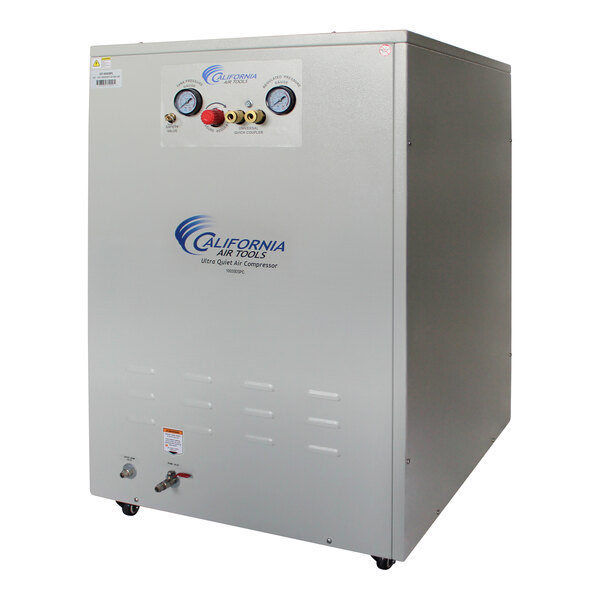 A white cabinet for a California Air Tools air compressor with a control panel and gauges.