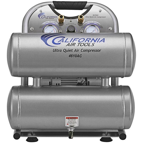 A California Air Tools silver air compressor with twin tanks and gauges.