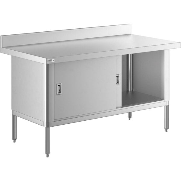 A Steelton stainless steel work table with sliding doors on an enclosed base.