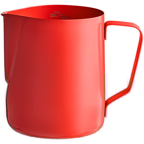 An Acopa red frothing pitcher with a handle.