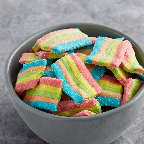 A bowl of Vidal Mini Sour Gummy Rainbow Belts.