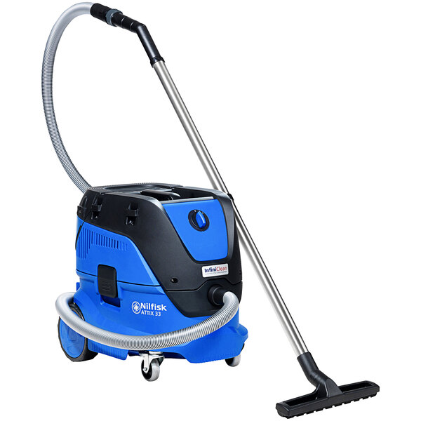 A blue Nilfisk wet/dry vacuum with a black hose.