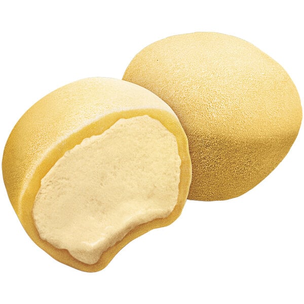 Two My/Mochi Mango Mochi Ice Cream balls with yellow filling.