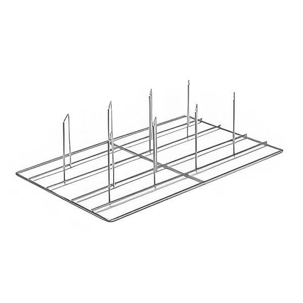 An Eloma chicken grid with a wire frame and metal spikes.