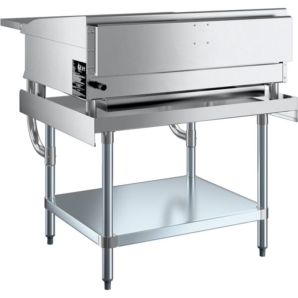 A stainless steel Cooking Performance Group manual griddle on a Regency Equipment stand.
