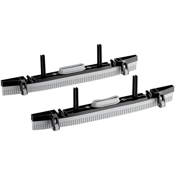 A pair of black and white plastic clips.