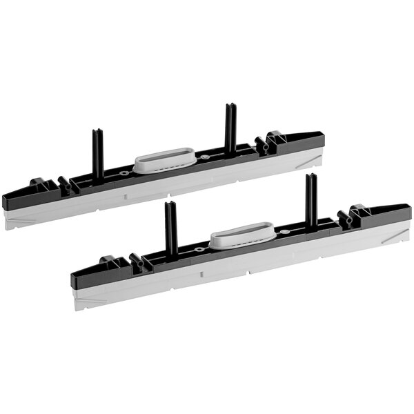 A pair of black and white plastic brackets.