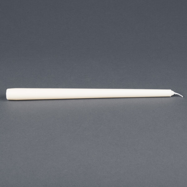 A pack of 12 ivory Will & Baumer taper candles.