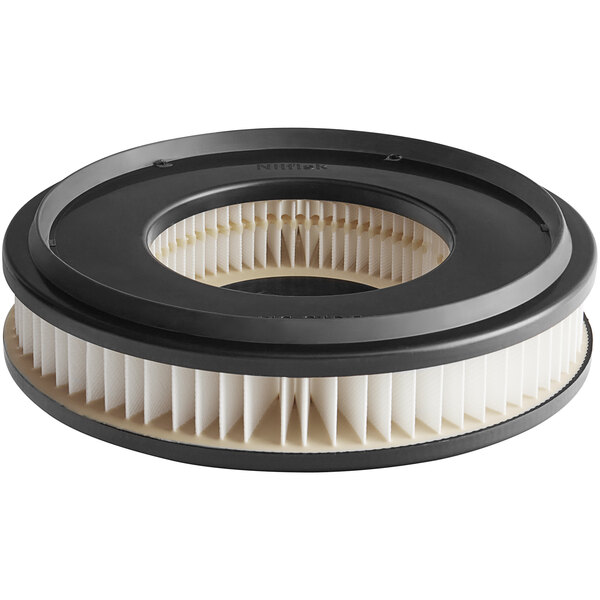 A circular Clarke filter cartridge with black and white plastic.