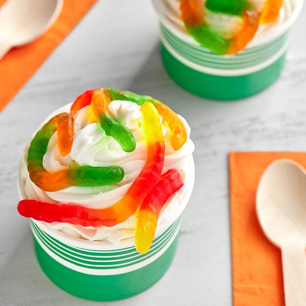 Two cups of ice cream with Kervan Gummy Worms on top.