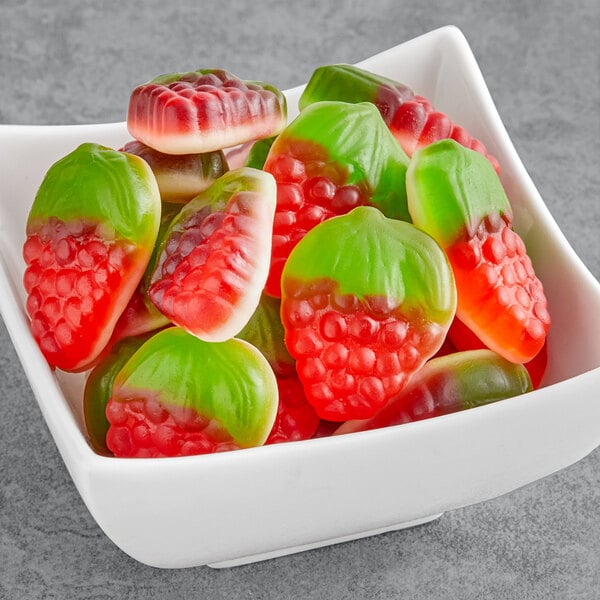 A white bowl filled with Kervan strawberry and cream gummies.